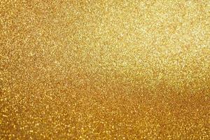 fond abstrait paillettes d'or scintillant photo