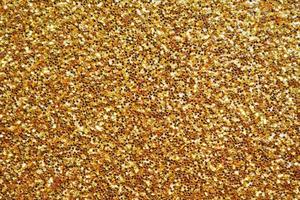 fond abstrait paillettes d'or scintillant photo