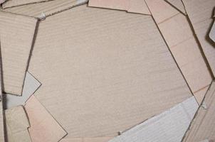 arrière-plan de textures de papier empilé prêt à recycler. un paquet de vieux cartons de bureau pour le recyclage des vieux papiers. tas de vieux papiers photo