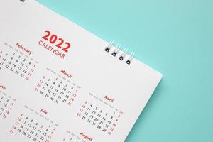 Page de calendrier 2022 sur fond bleu concept de réunion de rendez-vous de planification d'entreprise photo