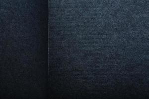 la texture d'une tablette de page vierge noire pour les pastels. fond noir de la texture du papier. photo