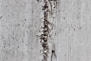 vue détaillée sur les murs en béton vieilli avec des fissures et beaucoup de structure en haute résolution photo