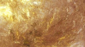 effet métallique de feuille de texture de fond d'or. surface de texture de marbre d'or, matériel de papier de modèle d'élément de conception. feuille de métal doré surface scintillante rougeoyante photo