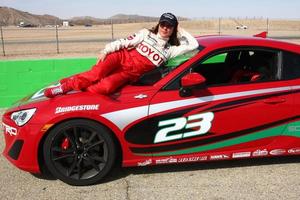 los angeles, 23 mars - kate del castillo avec le scion fr-s à la 37e formation annuelle de course de célébrités toyota pro au circuit international de willow springs le 23 mars 2013 à rosamond, ca photo exclusive