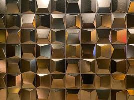 beaux carrés brillants convexes sculptés dorés. arrière-plan, texture photo