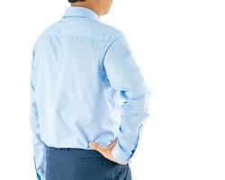 homme en chemise à manches longues porter debout avec akimbo with clipping path photo