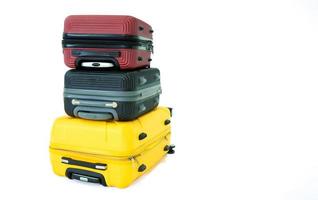 valise à roulettes, pile de bagages à roulettes, valise de voyage isolée sur fond blanc. photo