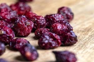 canneberges rouges séchées au sirop de sucre photo