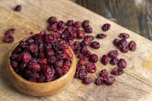 canneberges rouges séchées au sirop de sucre photo