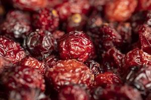 canneberges rouges séchées au sirop de sucre photo