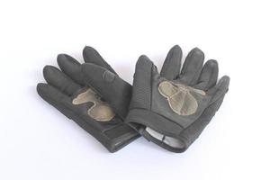 vieux gants noirs sales. photo