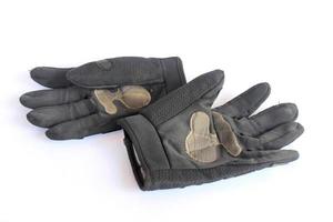 vieux gants noirs sales. photo