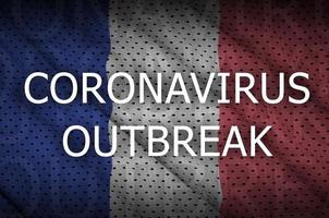 drapeau de la france et inscription de l'épidémie de coronavirus. virus covid-19 ou 2019-ncov photo