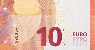 Fragment d'un billet de 10 euros en gros plan avec de petits détails rouges photo