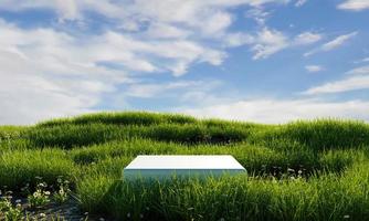 podium minimal blanc dans une prairie verte avec fond de ciel bleu. notion de nature. rendu 3d photo