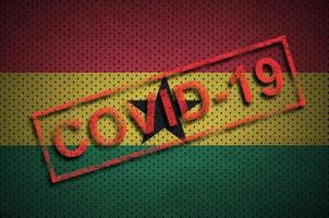 drapeau du ghana et timbre rouge covid-19. épidémie de coronavirus 2019-ncov photo