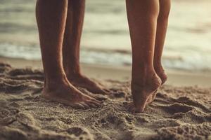 pieds de sable heureux photo