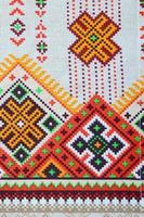 motif de broderie tricoté d'art populaire ukrainien traditionnel sur tissu textile photo