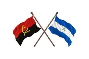 angola contre nicaragua deux drapeaux de pays photo