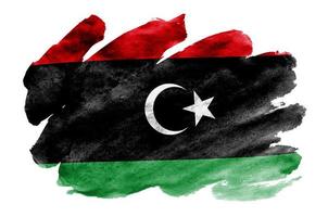 le drapeau de la libye est représenté dans un style aquarelle liquide isolé sur fond blanc photo