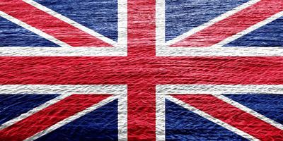 drapeau britannique sur un fond texturé. collage conceptuel. photo