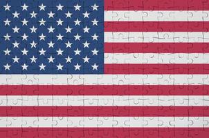 le drapeau des états-unis d'amérique est représenté sur un puzzle plié photo