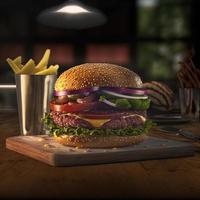 délicieux steakburger fait maison sur une vieille table en bois. gros plan d'aliments gras malsains. photo