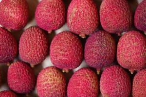 vue de dessus de fond de texture de litchi récolte de litchi frais de l'été de fruits tropicaux d'arbre en thaïlande photo