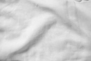 Linge de lit blanc texture dégradée style courbe floue de tissu de luxe abstrait, linge de lit froissé et ombres gris foncé, arrière-plan photo