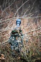 photo de chasse camouflée dans les branchages