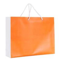 Sac en papier commercial orange isolé sur blanc avec un tracé de détourage photo