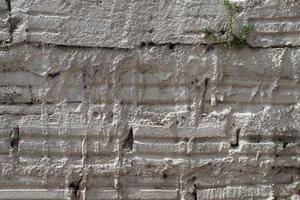 texture de mur de briques blanches avec une lumière réaliste. photo