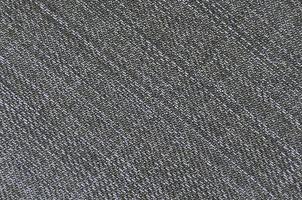 texture détaillée du tissu denim foncé photo