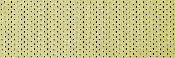 motif de fond textile en tissu de vêtements de sport en maille jaune photo