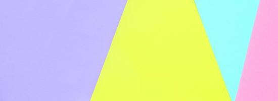 fond de texture de couleurs pastel de mode. papiers à motifs géométriques roses, violets, jaunes et bleus. résumé minimal photo