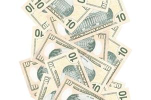 Billets de 10 dollars américains volant vers le bas isolés sur blanc. de nombreux billets tombant avec un fond blanc à gauche et à droite photo