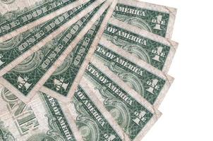 1 billets d'un dollar américain se trouvent isolés sur fond blanc avec espace de copie empilés en forme d'éventail de près photo