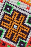 motif de broderie tricoté d'art populaire ukrainien traditionnel sur tissu textile photo
