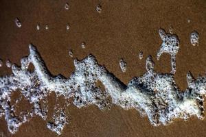 motifs dans le sable de la plage photo