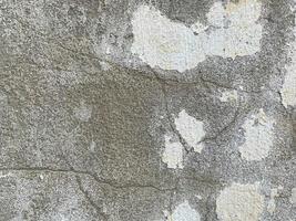 texture de la surface en béton du bâtiment gris cimenté. l'arrière-plan photo