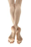 jambes féminines magnifiquement soignées sur fond blanc photo