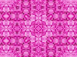 motif kaléidoscope floral magenta. fleur rose abstrait fond unique et esthétique photo