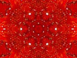 fond de kaléidoscope de feu rouge coloré fleur abstraite et motif symétrique photo