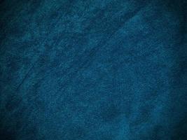 texture de tissu de velours bleu clair utilisée comme arrière-plan. fond de tissu bleu clair vide de matière textile douce et lisse. il y a de la place pour le texte... photo