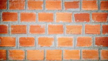 mur de briques close up texture background, style de mur de briques anciennes vintage rouge photo