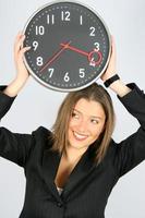 femme d'affaires et horloge photo