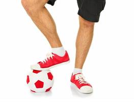 les jambes d'un footballeur photo