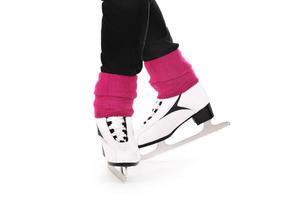 patins artistiques sur fond blanc photo