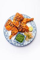 le poulet tandoori est un aliment épicé indien non végétarien photo