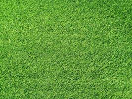 fond de texture d'herbe verte concept de jardin d'herbe utilisé pour faire un terrain de football de fond vert, golf d'herbe, gazon artificiel, fond texturé de motif de pelouse verte. photo